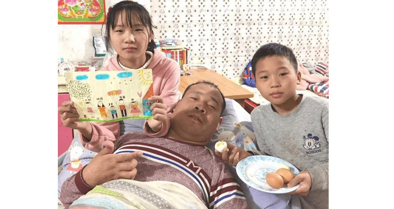 二女兒小兒子與父親郭戰士的合照